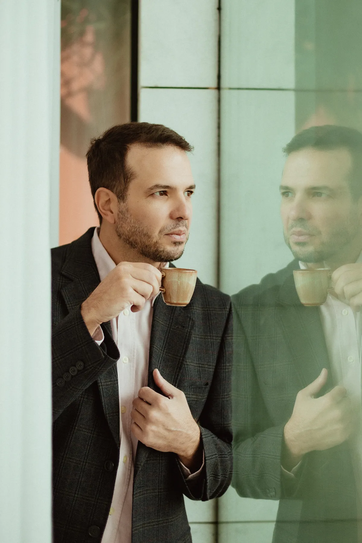 two women sitting on chair